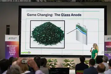 Empower Battery Technology presenting the Glass Anode at Midwest Deep Tech Demo Day, with Third Coast Foundry signage on stage